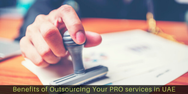 Benefits-of-Outsourcing-Your-PRO-services-in-UAE Close-up hand stamping of businessman for signing approval on documents