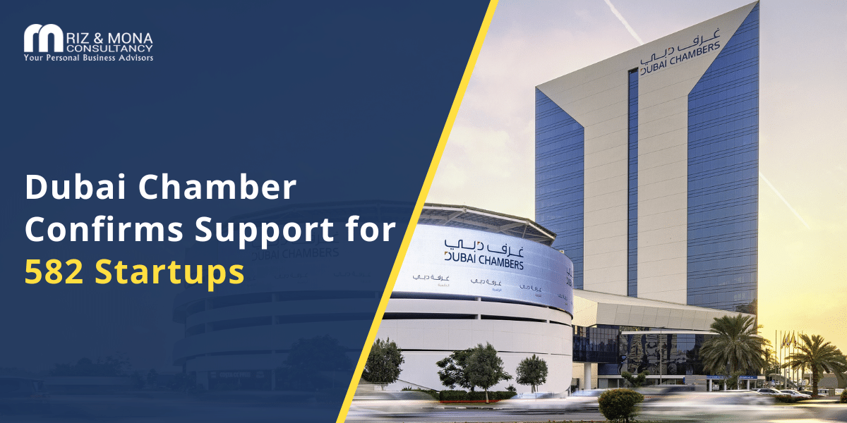 dubai-chamber-startup-support-2025 Professionals in a modern Dubai office discussing digital startup growth, reflecting Dubai Chamber's support.